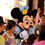Minnie Mouse visits a family at their breakfast table at Makahiki buffet