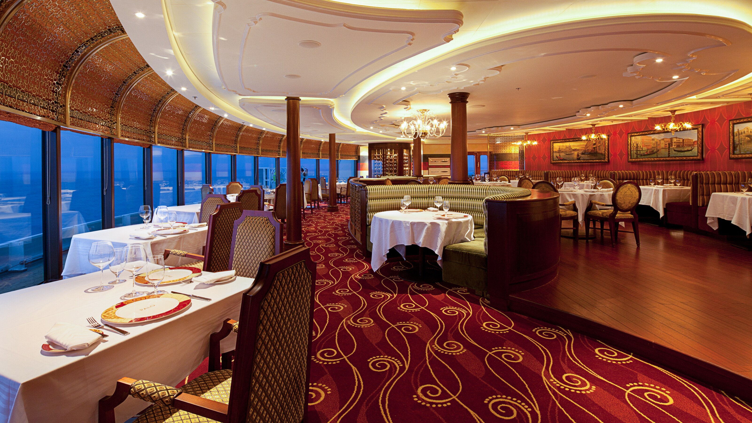 Dining room at Palo restaurant with Italian inspired decor, banquette seating and floor to ceiling windows