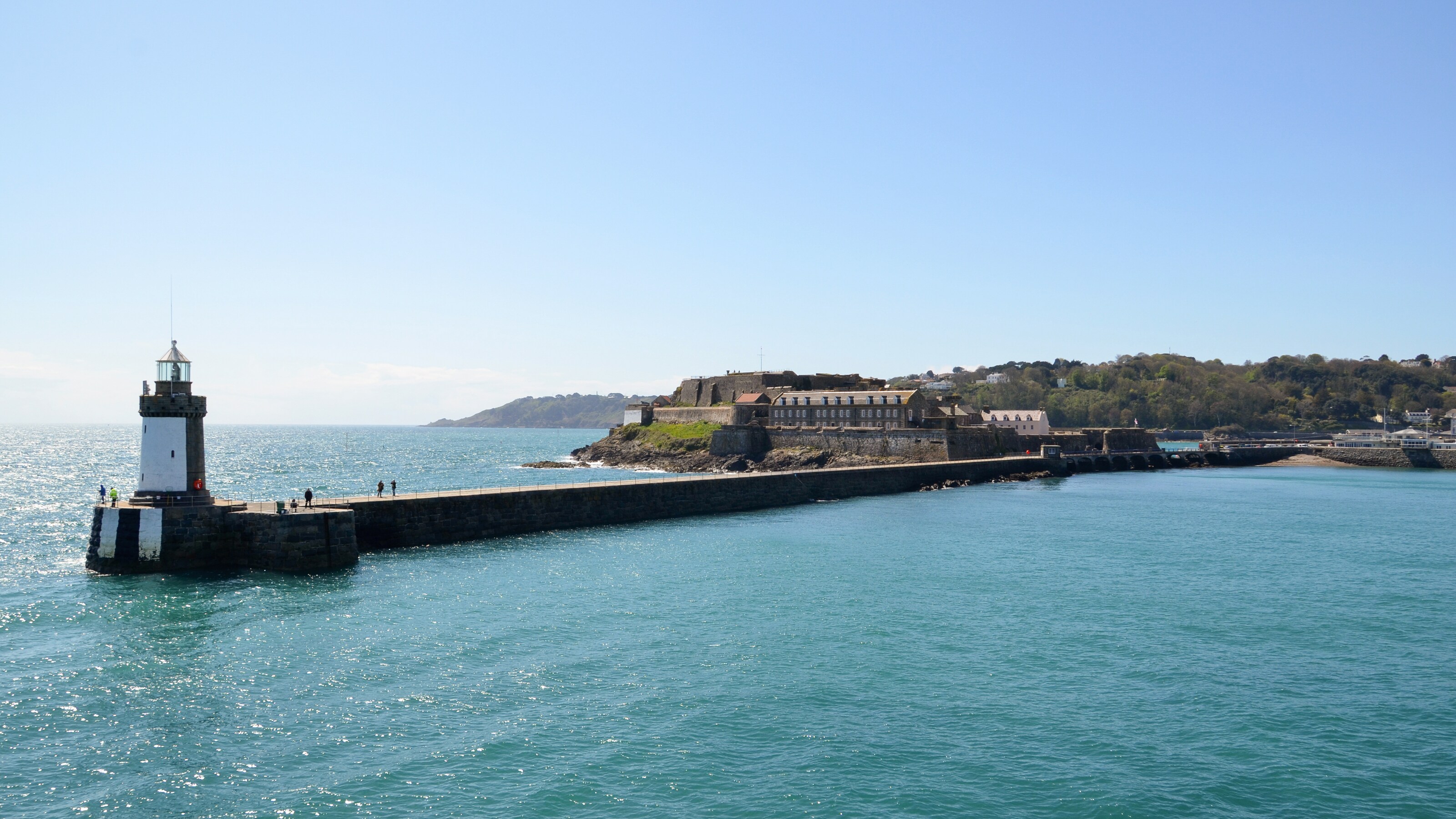 A lighthouse at the end of a pier