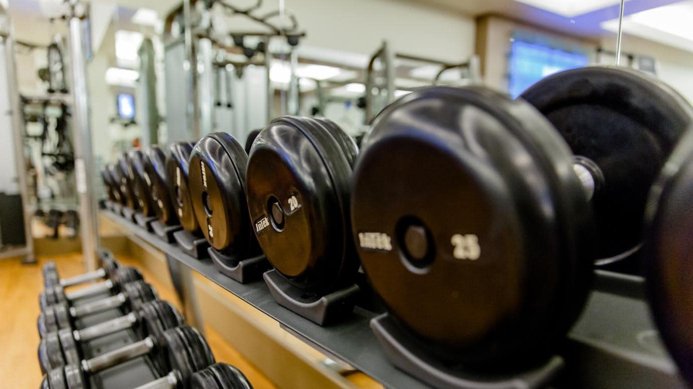 A row of free weights