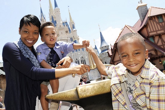 Grammy Award-winning singer Monica visits Magic Kingdom with her sons