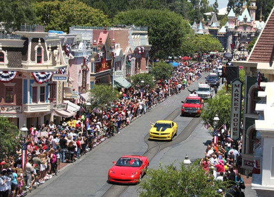 Cars driving in the parade