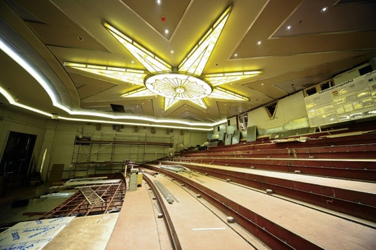 decorative ceiling and the stadium seating structure of the Buena Vista Theatre