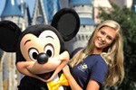 Miss Florida 2010 Jaclyn Raulerson, of Plant City, Fla., meets Mickey Mouse at the Magic Kingdom.