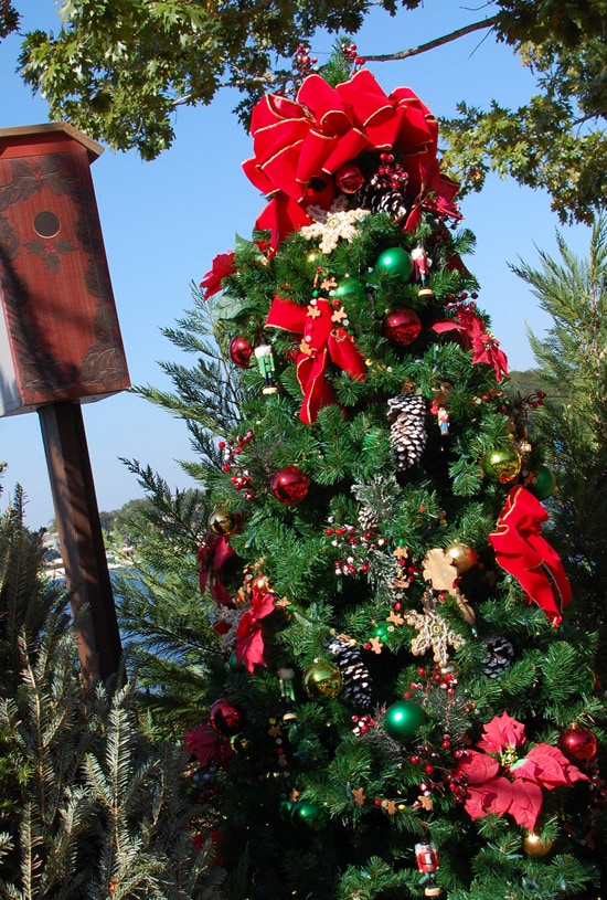A tree at the Germany Pavilion is ornamented with gingerbread snowflakes, nutcrackers and bows.