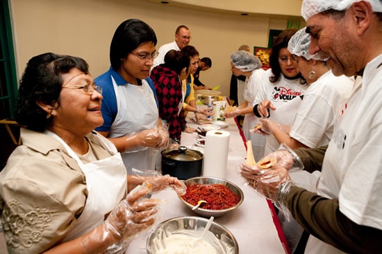 Disney VoluntEARS Helping Latino Health Access (LHA) at their annual Tamalada