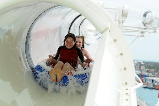 Maiden voyage guests enjoy an exhilarating ride on AquaDuck, the only shipboard water coaster