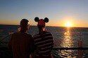 Disney Dream Guests Enjoy a Romantic Sunset at Sea as They Sail on the Maiden Voyage