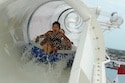 Children experience exciting twists and turns during a wild ride on AquaDuck