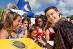 (MAY 30, 2011): Newly crowned 'American Idol' Scotty McCreery (right) signs an autograph May 30, 2011, for fan Sarah Solley (left), age 15, from Orlando, Fla., at Disney's Hollywood Studios in Lake Buena Vista, Fla. McCreery was honored in a parade at the Disney theme park and performed his new single 'I Love You This Big.' On Wednesday, the 17-year-old singer was crowned the new 'American Idol' on the season finale which was viewed by an estimated 29.3 million people. (Matt Stroshane, photographer)