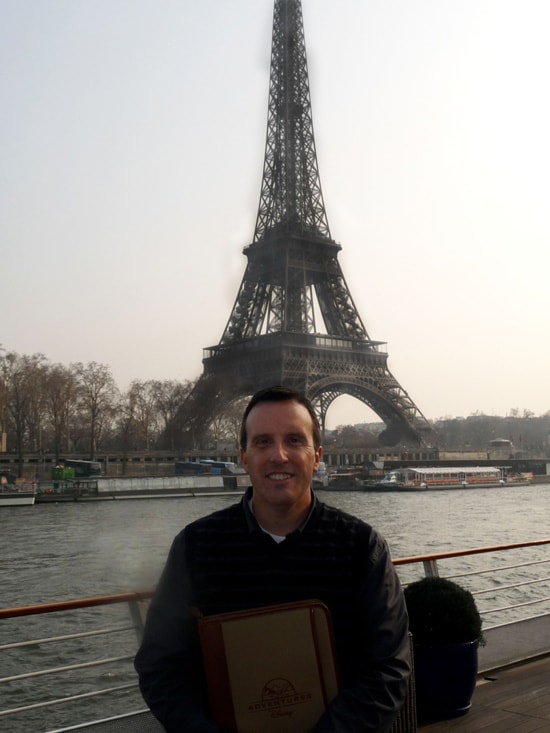 Regional Director of Adventures by Disney, Fred Zappala, in Front of the Eiffel Tower in Paris