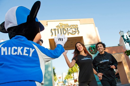 'Survivor' Winners Ethan Zohn and Jenna Morasca at Disney's Hollywood Studios with Mickey Mouse as Part of the Walt Disney World Marathon Weekend Presented by CIGNA
