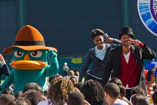 First Lady Michelle Obama joins Perry The Platypus and choreographer Rosero McCoy in performing 'The Platypus Walk,' made famous in Disney Channel’s series 'Phineas and Ferb.' Mrs. Obama was at Walt Disney World Resort to celebrate the second anniversary of her Let's Move! initiative and the Disney Magic of Healthy Living, both of which promote healthier lifestyles among children and families.