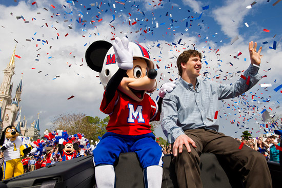 Super Bowl MVP Eli Manning with Mickey Mouse at Magic Kingdom Park