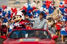 Super Bowl MVP from the New York Giants Eli Manning with Mickey Mouse at Walt Disney World Resort