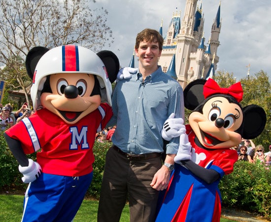 Super Bowl MVP from the New York Giants Eli Manning with Mickey and Minnie Mouse at Walt Disney World Resort