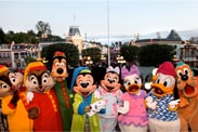 Mickey Mouse and his friends in their Pajamas in Front of the Main Street Train Station at Disneyland Park