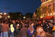 Guests Walking Down Main Street, U.S.A. in Disneyland Park