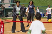 First Lady Michelle Obama participates in a fitness activity with local children at the Magic of Healthy Living event at ESPN Wide World of Sports Complex. The event celebrated the First Lady's 'Let's Move!' initiative and recognized Disney's efforts to promote healthier lifestyles among kids and families.