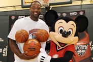 On the heels of recruiting Lebron James and Chris Bosh to join him in South Florida, Miami Heat star Dwyane Wade visits the complex, and plays in a special 3-on-3 basketball game with AAU girls’ basketball players and Mickey Mouse.