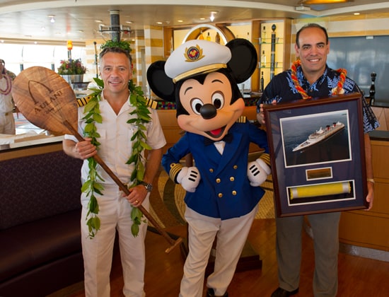 Captain Fabian, Captain Mickey Mouse, and Elliot Mills, Vice President & General Manager of Aulani