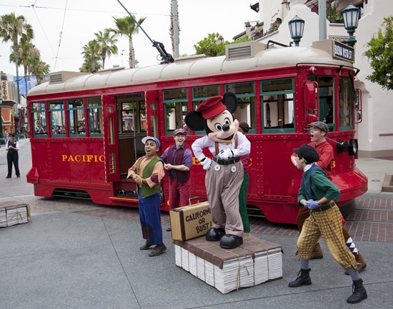 The Red Car Trolley News Boys with Mickey Mouse on Buena Vista Street at Disney California Adventure Park