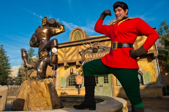 Gaston and his Statue in Front of Gaston's Tavern in New Fantasyland at Magic Kingdom Park