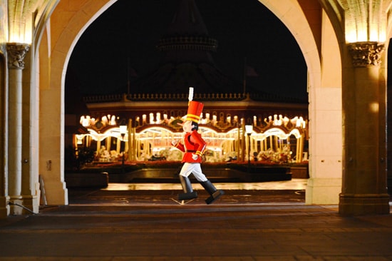 A Hopeful Toy Soldier Practices for Mickey's Once Upon A Christmastime Parade at Magic Kingdom Park