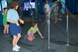 Climb Through a Full-Size Model of a Turtle Excluder Device on Endangered Species Day at The Seas at Epcot and Disney’s Animal Kingdom