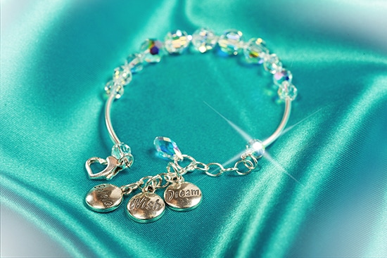 Sterling Silver Bracelet With Sparkling Swarovski Srystals and Three Charms Featuring the Words 'Dream,' 'Wish' and 'Believe'