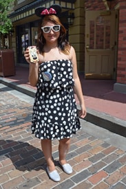 A Graphic Take in Black and White, we Love How the Accessories Pop From the Pink Minnie Bow and Cell Phone Cover to the White Sunnies and Silver Flats