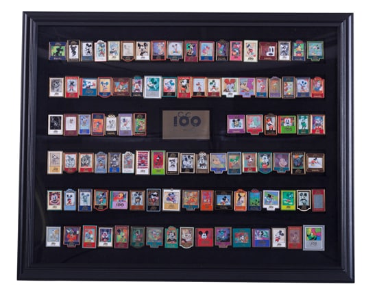 Developed in 2002 in Celebration of the 100th Birthday of Walt Disney, this Framed Commemorative Pin Set Includes One-Hundred Limited-Edition Pins Inspired by the Artwork of Artist Eric Robison