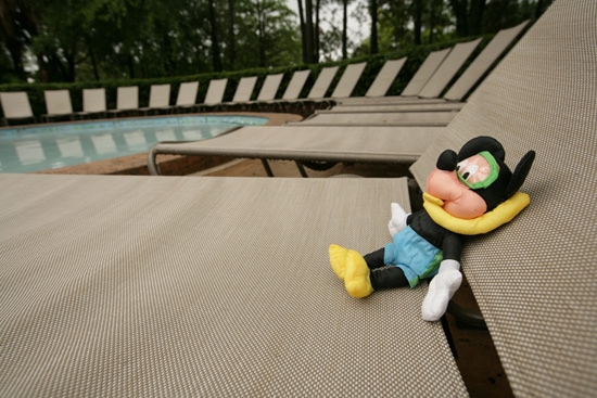 Caption This: Mickey Mouse Lounges Poolside