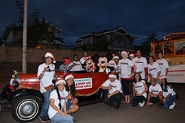 Mickey, Minnie and Disney VoluntEARS at the Kapolei Holiday Lights Parade