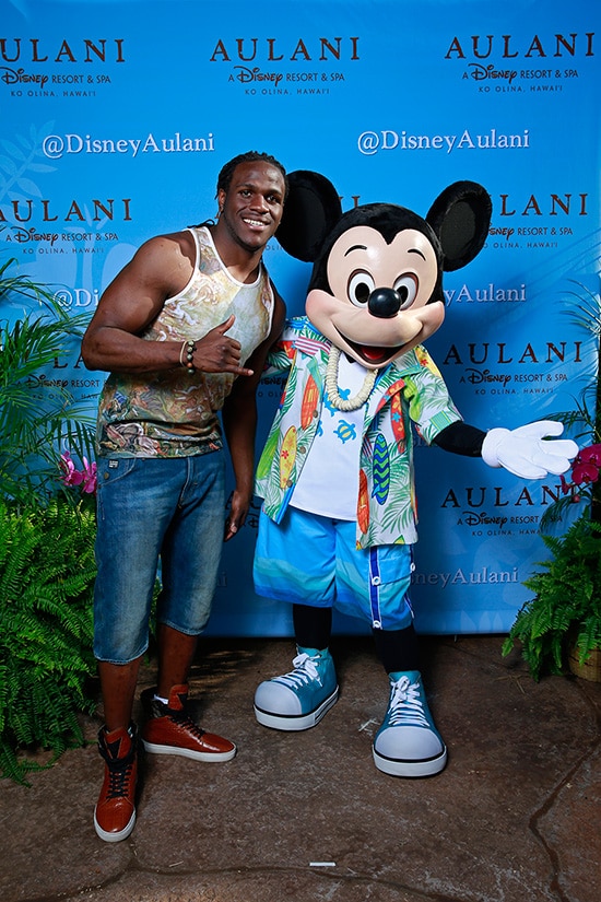 NFL Pro Bowl Running Back Jamaal Charles of the Kansas City Chiefs with Mickey Mouse at Aulani, a Disney Resort & Spa