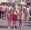 @rOsRMEpzHS: My Sister and I Excited to Hold Pinnochio's Hand at Disneyland in the 60s.