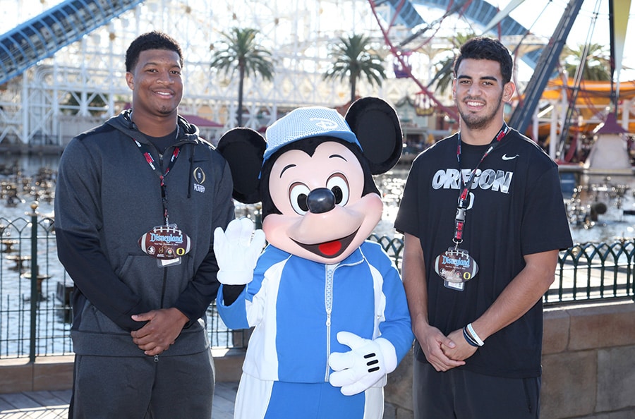 Image result for jameis winston and marcus mariota with mickey mouse