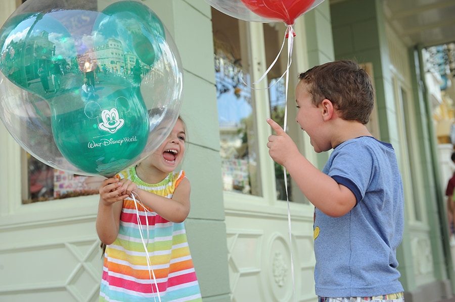 Caption This: Balloons Equal Excitement at Magic Kingdom Park