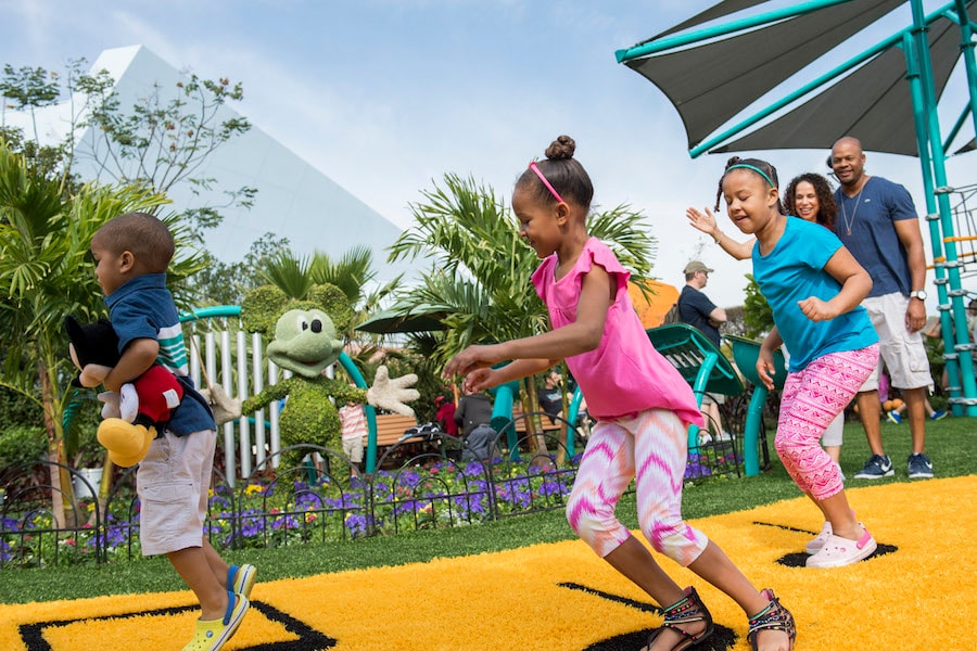 Guests play and make music with favorite Disney characters at Music Garden Melodies in Future World near Test Track during the Epcot International Flower & Garden Festival. The festival, which runs 90 days March 2-May 30, 2016 at Walt Disney World Resort in Lake Buena Vista, Fla., features dozens of character topiaries, stunning floral displays, gardening seminars and the Garden Rocks concert series - all included in regular Epcot admission. (Chloe Rice, photographer)