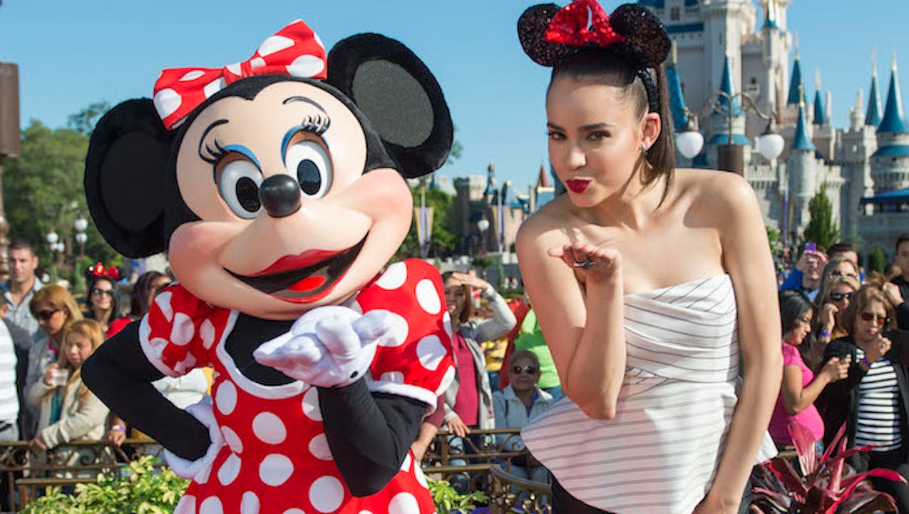Hollywood Records singer-songwriter and Disney Channel actress Sofia Carson with Minnie Mouse at Magic Kingdom Park