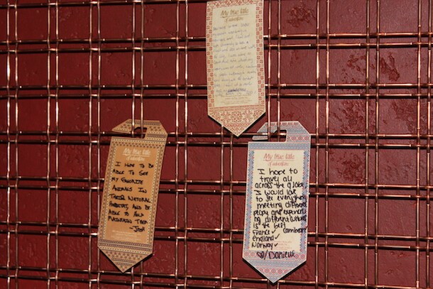 Personalized Tags Featuring Stories of Animals and Travel from Guests Hang in the Nomad Lounge at Disney's Animal Kingdom