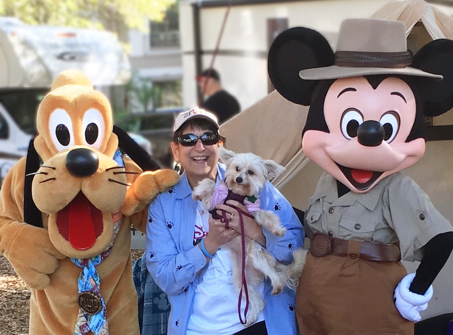 Marianne Hunnel with Sandy Sue at Paws in the Park, a community event in Orlando supported by Walt Disney Parks & Resorts