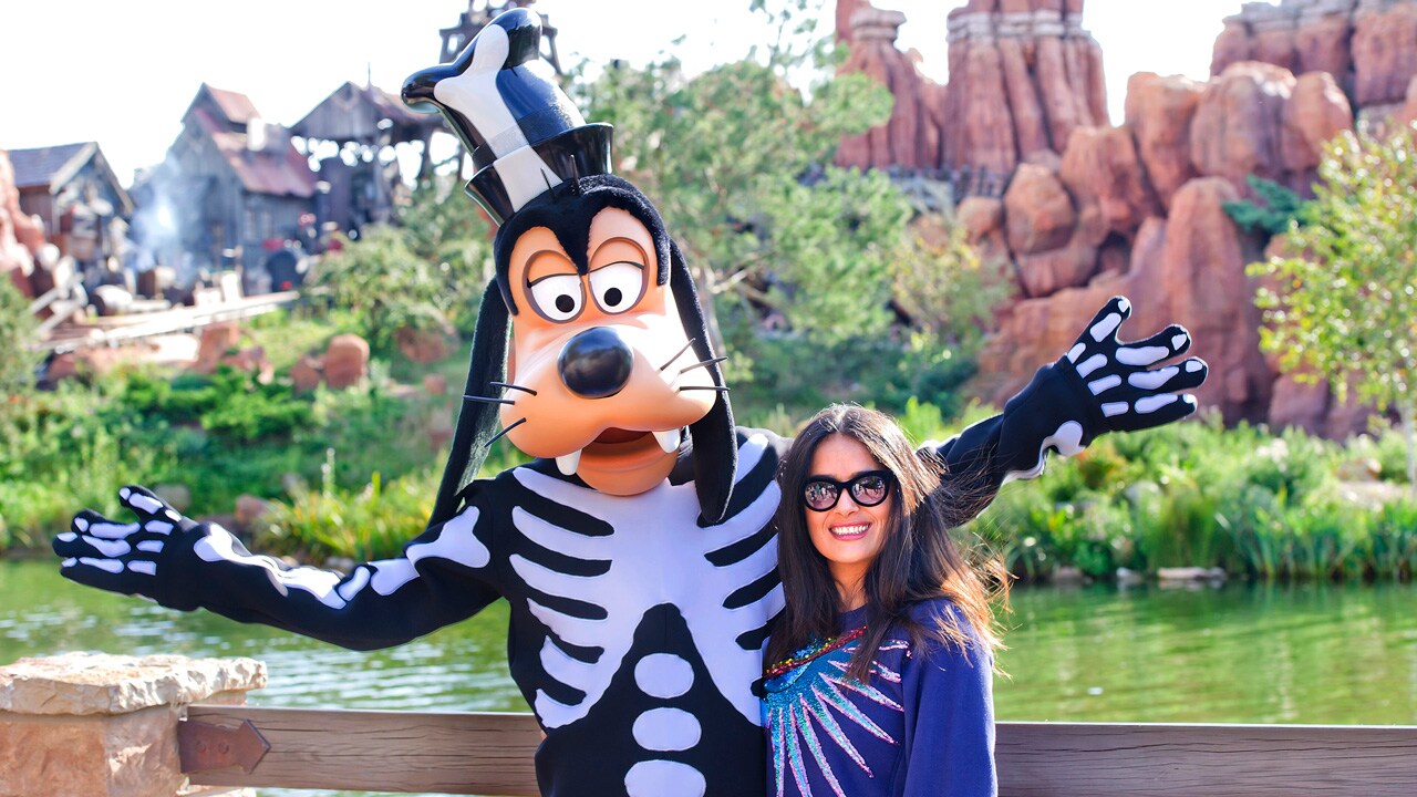 Salma Hayek and Laetitia Casta Get a Goofy Hug at Disneyland Paris