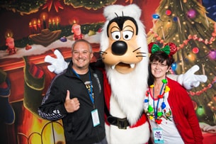 Guests with Santa Goofy during Disney Parks Blog 