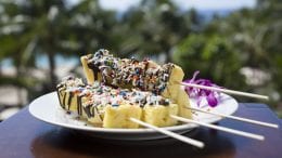 chocolate-drizzled pineapple skewer