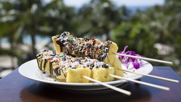 chocolate-drizzled pineapple skewer