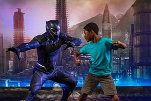 Guests meet Black Panther during Marvel Day at Sea aboard the Disney Magic