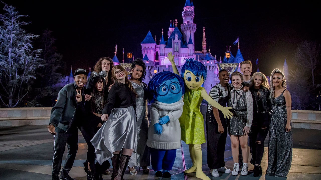 ‘American Idol’ Top 10 contestants pose with Joy and Sadness from "Inside Out" at Disneyland Park