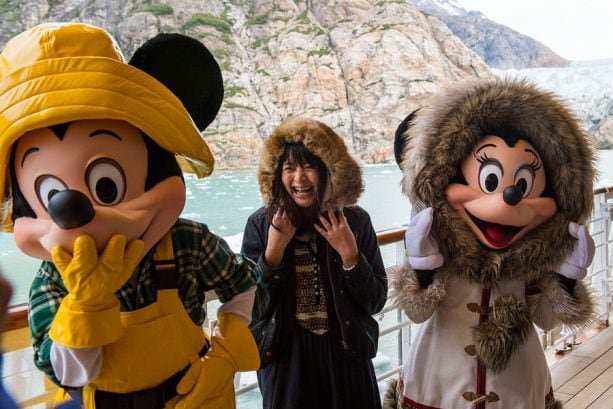 Guest with Mickey Mouse and Minnie Mouse on a Disney Cruise in Alaska