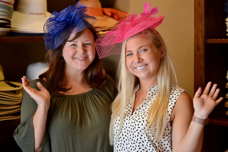 Guests pose with hats from Chapel Hats